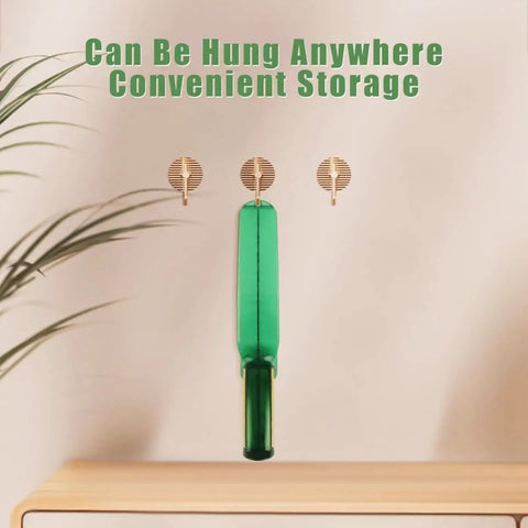 Ergonomic Mattress Lifter Wedge And Bed Maker Tool hung on wall for storage; view of tool design and hanging capability.