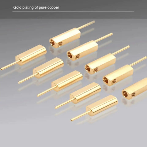 Gold-plated pure copper connectors for electronics, showing multiple units on a reflective surface.