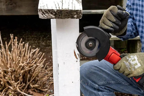 Aggressive Four And A Half Inch Cut Off Wheels Pack Of Five For Angle Grinders General Purpose Cutting Discs With Norton Aluminum Oxide Grain And Proprietary Bond For Long Life And More Cuts Per Wheel When Cutting Metal And Stainless Steel being used on a wooden post