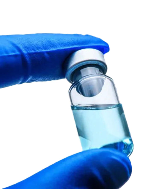 15ml glass vial with sealed cap, held by blue-gloved hands containing blue liquid.
