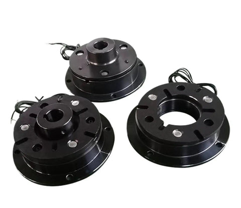 Three black DZD5 electromagnetic brake housings with central bore and wiring for clutch assembly