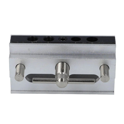 Front view of Self Centering Doweling Jig Kit with Adjustable Width Drilling Guide and Six Bushings, silver finish.