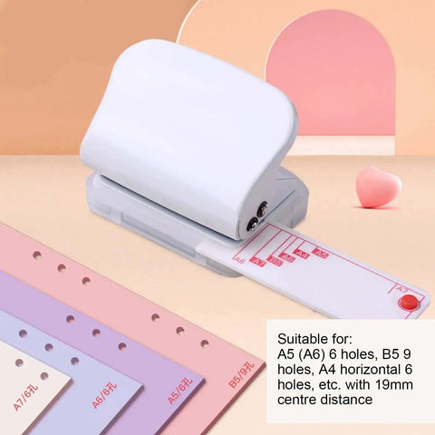 3 Hole Punch For Scrapbooks And Loose Leaf Pages Handheld Portable Hole Puncher With Positioning Post And Ruler shown on a table