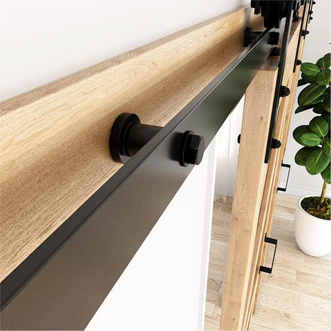 Installed view of 1-3/8 Inch Sliding Barn Door Track Spacers Replacement Kit With Adjustable Carbon Steel Connectors Including Lag Bolts And Wall Anchors Pack Of 4