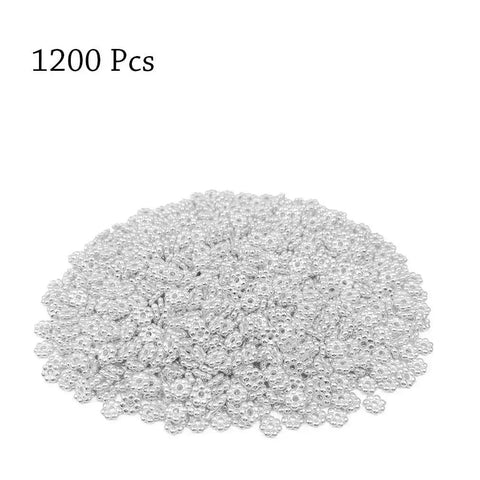 1200pcs Silver Flower Shape Septal Beads 1200Pcs Daisy Spacers CCB Spacer Beads For Bracelet Necklace Earring Jewelry Making Tibetan Style Loose Beads Sweet Do It Yourself Craft Projects displayed in a pile.