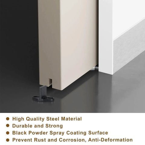Image showing Four Pack Black T Shape Barn Door Floor Guides for Sliding Doors Bottom Track Hardware installed on barn door.