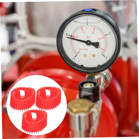 Gas regulator pressure gauge with red silicone protector boots; three boots shown in inset.