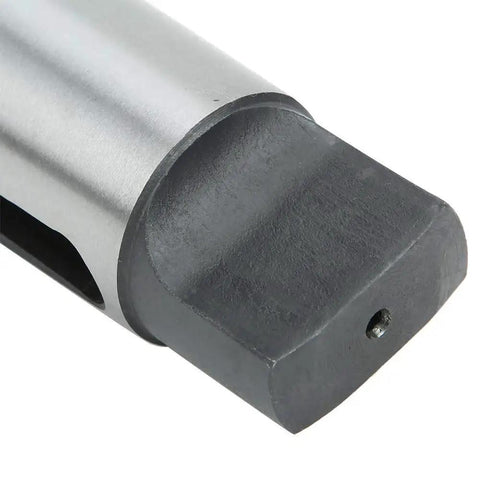 Close-up of Baxnore MT5 to MT4 taper reducing drill sleeve; metal body with dark gray end and small hole