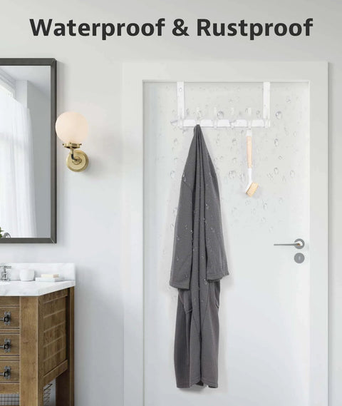 Bathroom door with waterproof and rustproof over-the-door rack holding wet towel and brush