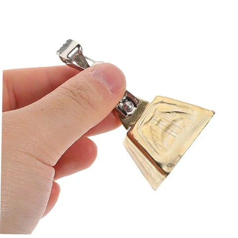 Close-up of hand holding single clip-on stainless steel fishing rod alarm bell from the 15 Piece Clip On Fishing Rod Alarm Bells Set.
