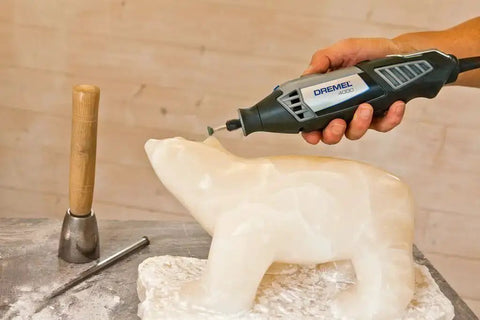 Using rotary tool on polar bear sculpture with Collets Kit For Rotary Tools With Four Collets And One Collet Nut, Includes 0.8mm, 1.6mm, 2.4mm And 3.2mm Sizes, Precision Accessory Set Up To 35,000 RPM, Easy Swap, Great For Hobbyists And Pros.