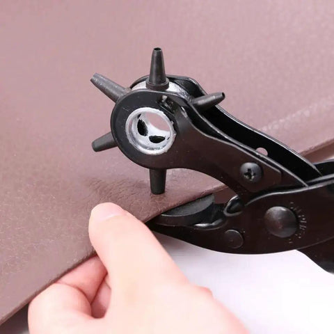 Heavy Duty Adjustable Hole Punch Pliers Kit With Revolving Leather Belt Hole Punch in use on leather material