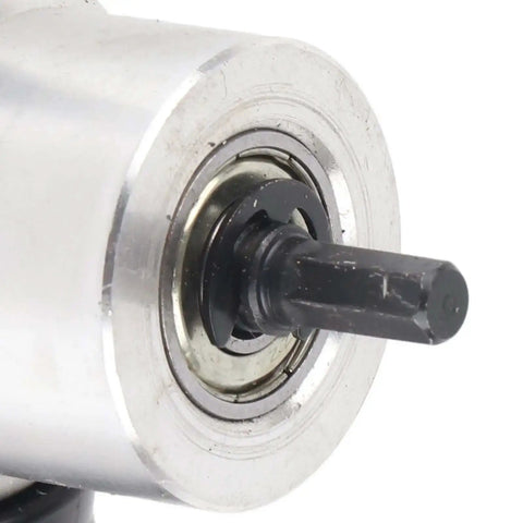 Close-up of dual head metal sheet cutter and nibbler drill showing tool steel cutter head for circle cutting and machining.