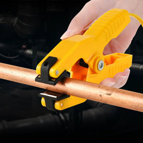 Yellow plastic HVAC pipe clamp thermometer for K-type thermocouples, clamped on copper pipe