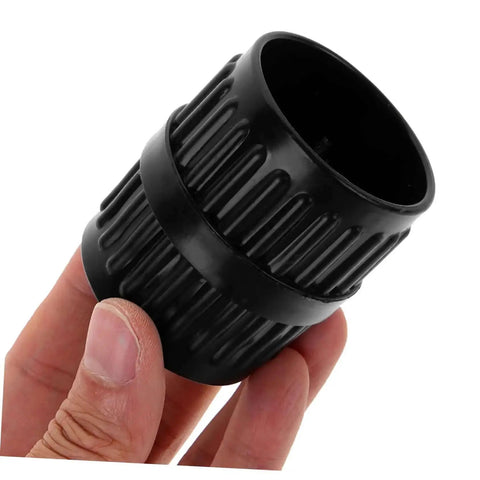 Close-up of black plastic Tubing Deburring Reamer Set 2 Pcs Inner Outer Reamer Tool for pipes in hand.