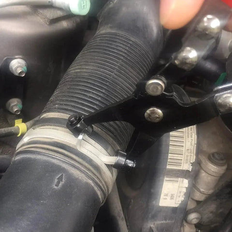 Two Piece Hose Clamp Pliers Set With 45 Degree Angle Flat Belt Hose Clamp Pliers And Wide And Flat Band Hose Clamp Pliers in use on a car hose