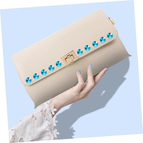 Beige clutch with blue punk rivets from Punk Rivets And Spike Studs For Shoes Belts Jackets Bags DIY Accessories Kit