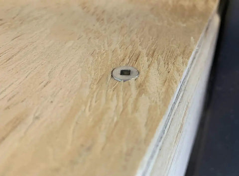 Close-up of No. 8 X 2 Inch Type 316 Marine Grade Stainless Steel Deck Screw installed in wooden deck