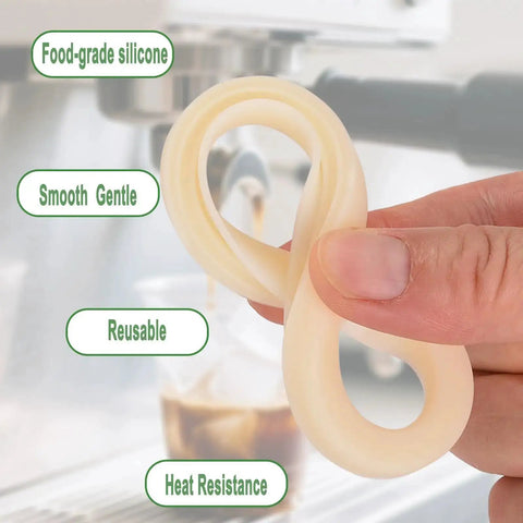 Silicone Steam Ring 54mm Gasket Replacement For Espresso Machines Easy Install Two Pack held in hand near espresso machine.