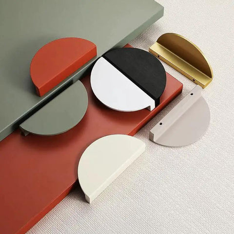 Assorted colored semicircle cabinet pulls displayed flat, highlighting various finishes; describe various types similar to Green Half Moon Drawer Pulls 2.5 Inch.