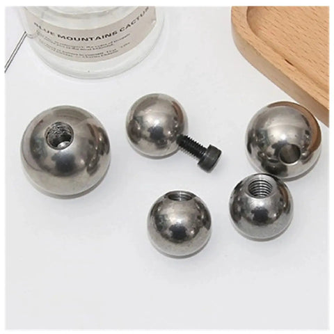 Stainless Steel Piercing Replacement Balls M6 Threaded Half Hole 10 12 Mm in various sizes and views on a surface