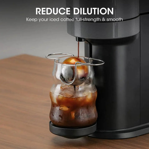 AIEVE XL Espresso Cooling Ball, stainless steel 2-pack, used to chill iced coffee in a glass carafe on a coffee machine