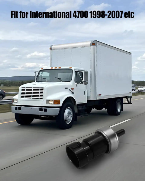 Vaticas air brake pressure switch, black plastic body with silver collar, shown beside a white International box truck.