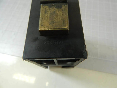Close-up of Single unit Stop latch with proximity sensor CLAMP 310A for industrial gate safety interlock switch, metal component visible.