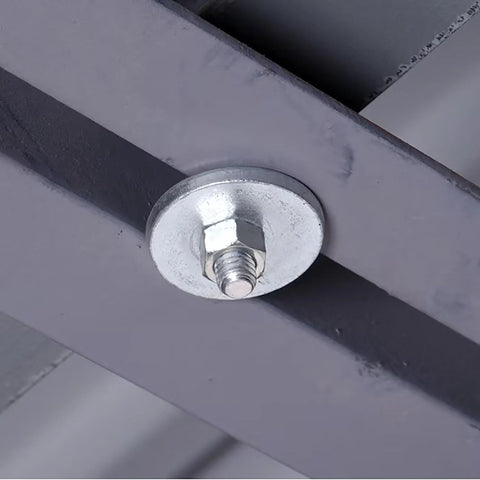 Fender washer with bolt fastened to gray metal beam; 1/2 inch, stainless steel finish.