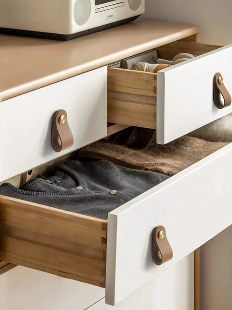 Two open drawers with brown leather drawer pulls 6 pack for kitchen cabinets and drawers, textured leather handles with grain finish.