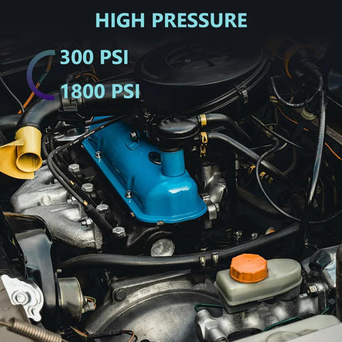 5/16 transmission oil cooler hose installed in engine bay; blue valve cover and black hoses