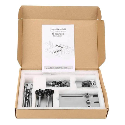 Open box view of Three In One Dowel Jig Kit with Self Centering Dowel Jig, Drill Locator and Adjustable Drill, includes clamp board.