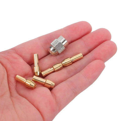 Person holding Miniature Drill Chuck Collet Set With Ten Copper Core Collets And Two Wrenches For Precision Grinding Machines.
