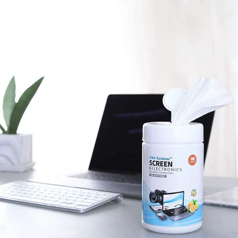 Container of Streak Free Monitor Cleaning Wipes For Electronics Screens And Glasses on desk with laptop and keyboard