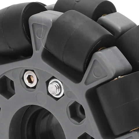 Close-up of a 100mm double plastic omnidirectional wheel with rubber rollers, designed for 360-degree robot mobility, 20kg load capacity.