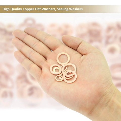 Hand holding copper sealing washers from Copper Sealing Washers Kit, Kindroufly 320 Pieces, 11 Metric Sizes M5 To M20.