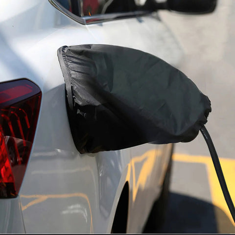 All Weather EV Charger Port Cover For Outdoor Charge With Magnetic Attachment, Waterproof Snow Rain UV Shield Keeps Port Dry And Ice Free, Fits Steel Bodied Electric Vehicles LZSTEC installed on a vehicle's charging port.