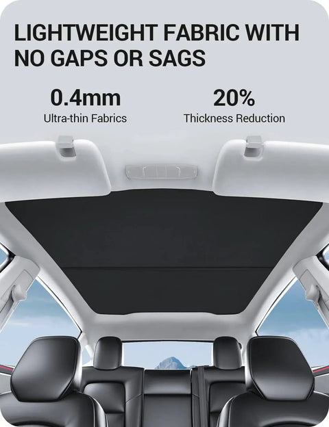 Interior view of Model Y Juniper Sunshade Roof Cover 2025 2026 No Gap Foldable Heat Insulation UV installed in a vehicle.