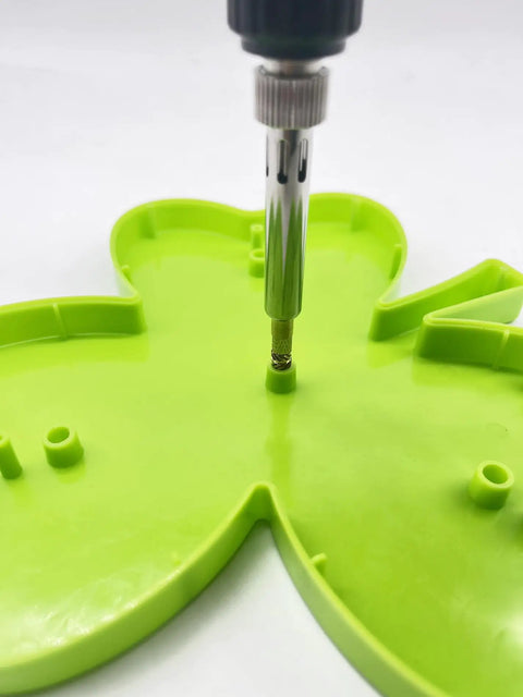 Heat Set Brass Threaded Inserts Kit For 3D Printing being installed in green plastic component