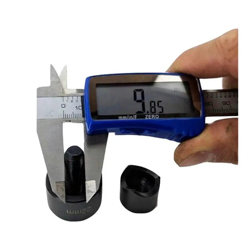 Digital caliper measuring component of 22mm And 20mm Hole Punch Kit With Knockout Die And Punch Set For Homebrew Projects.