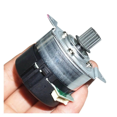 Hand holding 12-24V Brushless Servo Motor With Built-In Drive And Encoder, PWM Speed Control visible, compact and durable design