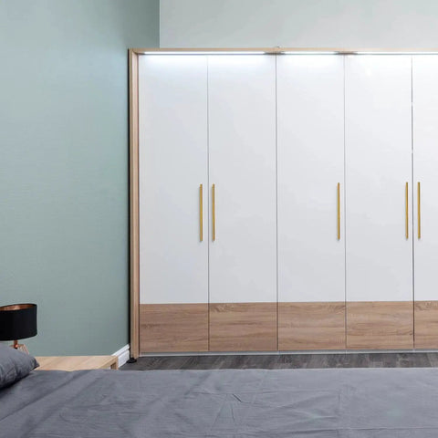 Installed Brushed Gold Cabinet Handles 10 Inch Set Of 5 Stainless Steel Drawer Pulls on modern bedroom cabinets showcasing sleek satin finish.