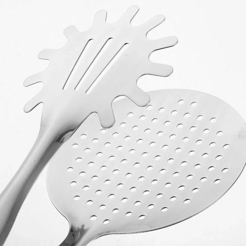 Close-up of stainless steel oil filter food clip and frying tongs for steak draining deep fry strainer and grilling tool