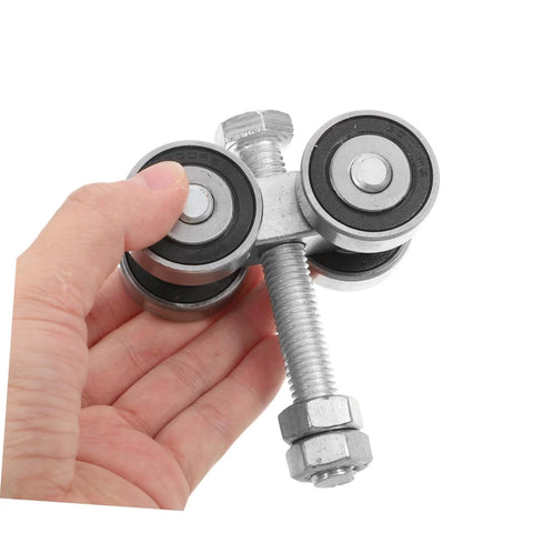 Stainless Steel Double Bearing Caster Wheel For Sliding Gates And Barn Doors Heavy Duty Track Roller held in hand, side view.