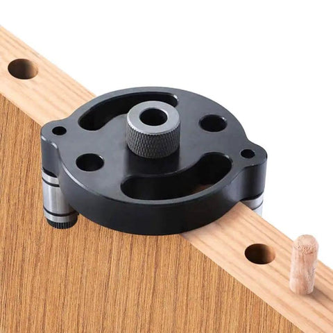 Self Centering Doweling Jig For Straight Holes Handheld Drill Guide with adjustable feet on wood board