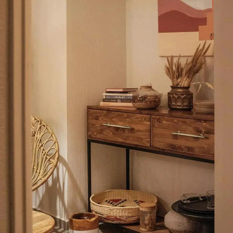 Living room with cabinet featuring Vintage Retro Antique Brass Zinc Alloy Cabinet Handles 6 Pack, decorated with books and plants.