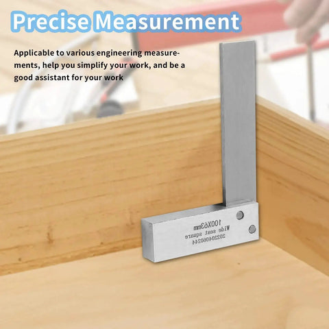 Machinist Square For Woodworking 4 X 2.5 Inch High Precision Mechanical Steel L Type Right Angle Square With Wide Seat Built To Last Heavy Duty 90 Degree Engineer Tool For Precise Framing And Marking Includes Blue Storage Box 100 X 63mm shown measuring a wooden corner for precision.