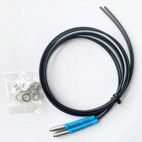 FT610 Diffuse Reflective Optical Fiber Sensor With 1M Line, 2mm Fiber Outer Diameter, M6 Probe, shown with accessories
