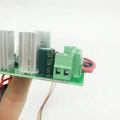 Side view of DC PWM Motor Speed Controller 6V To 30V With 6A Rated Current 10A Peak showing circuitry and connectors