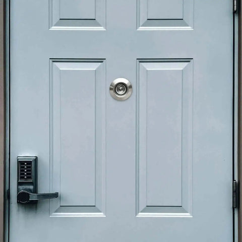 Solid Brass Door Peephole Viewer With 220 Degree HD Lens, Heavy Duty Privacy Cover installed on a door, Satin Nickel Finish